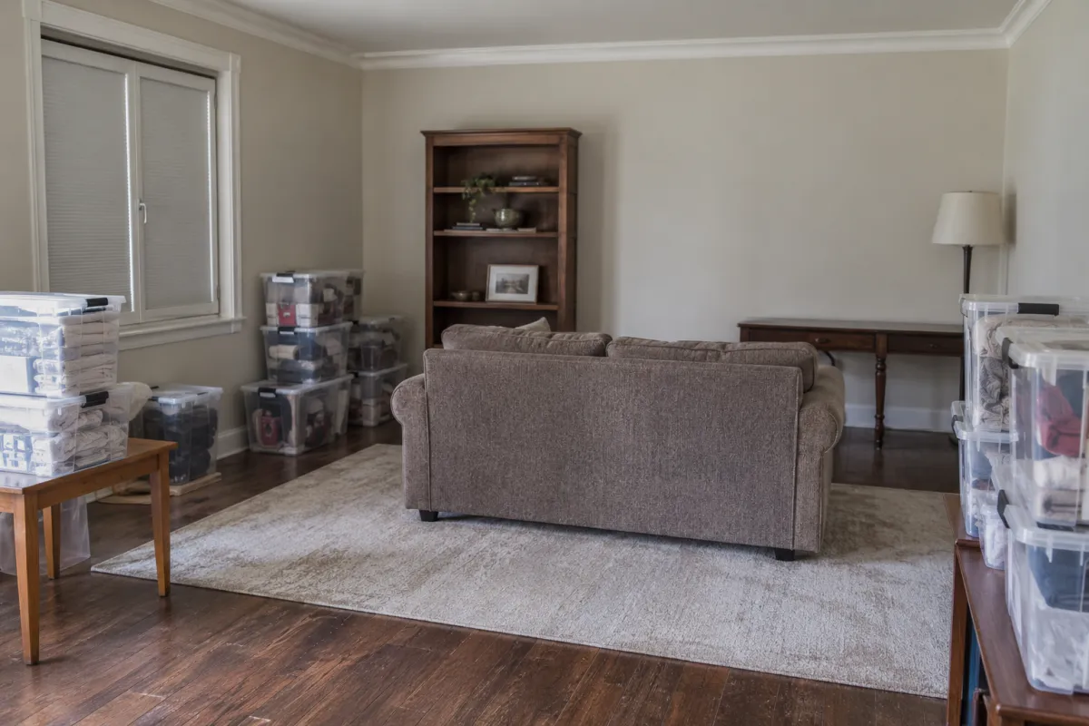 A room prepared for space treatment, with windows closed, food and bedding in sealed boxes and furniture pulled away from the walls